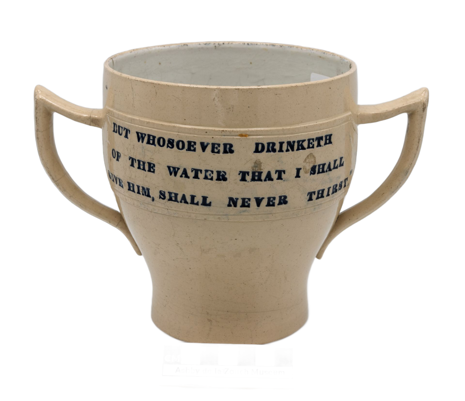 Wooden gong with mallet, and brass bell suspended from a frame.