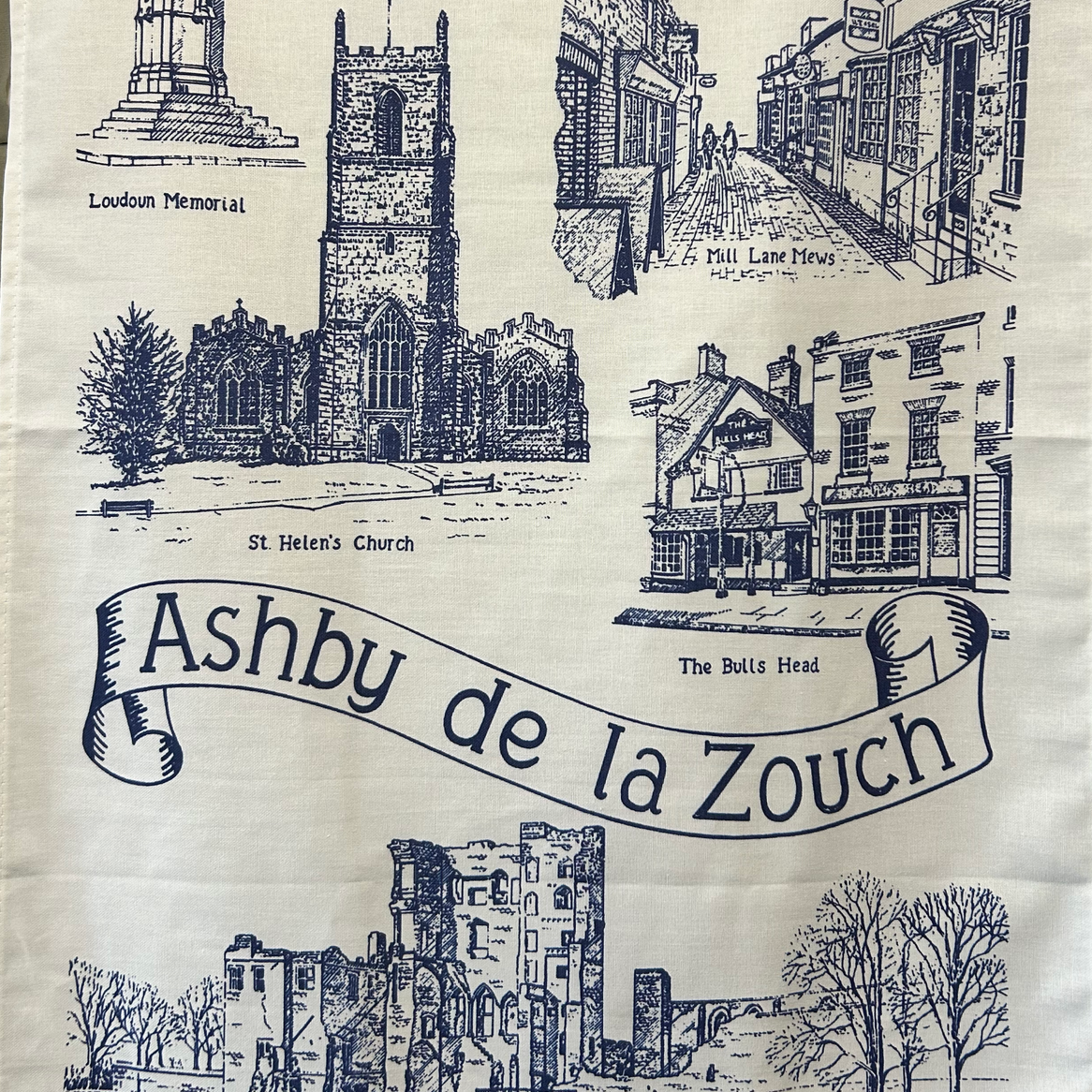 Blue and white tea towel featuring Ashby de la Zouch landmarks, including St. Helen's Church and Ashby Castle.
