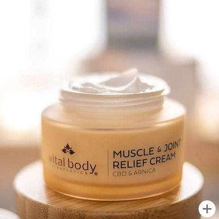 A jar of vital body muscle and joint relief cream