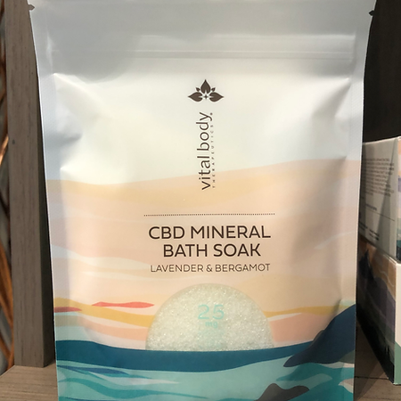 A bag of vital body cbd mineral bath soak lavender and bergamot