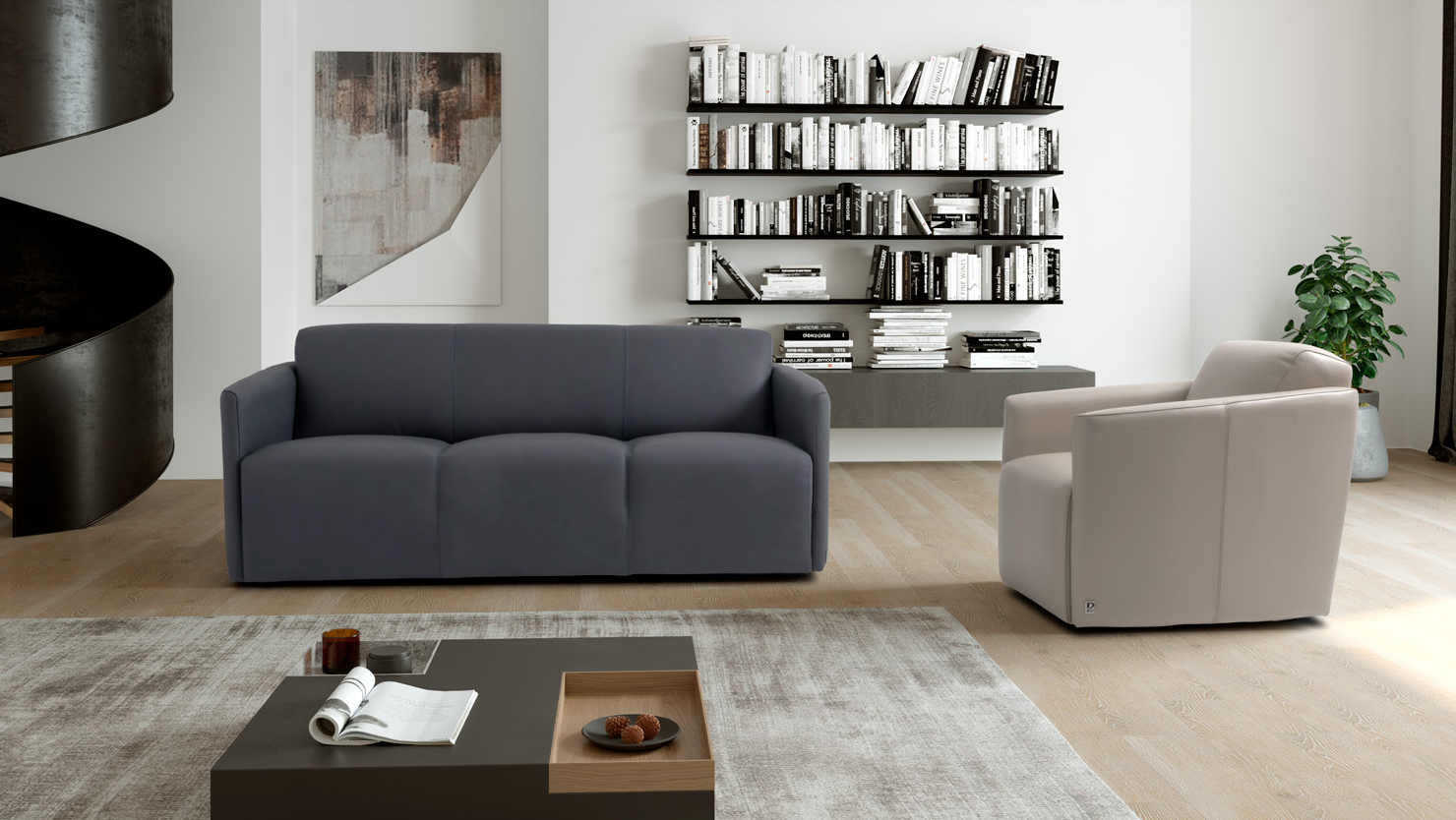 Ein Wohnzimmer mit einem Sofa, einem Stuhl und einem Couchtisch.