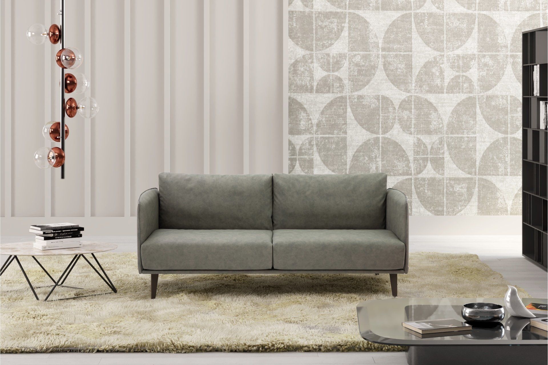 Un soggiorno con un divano e un tavolino da caffè