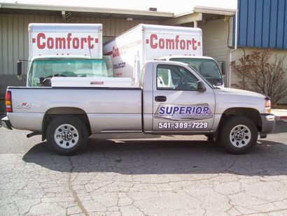 A white truck with the word comfort on the side