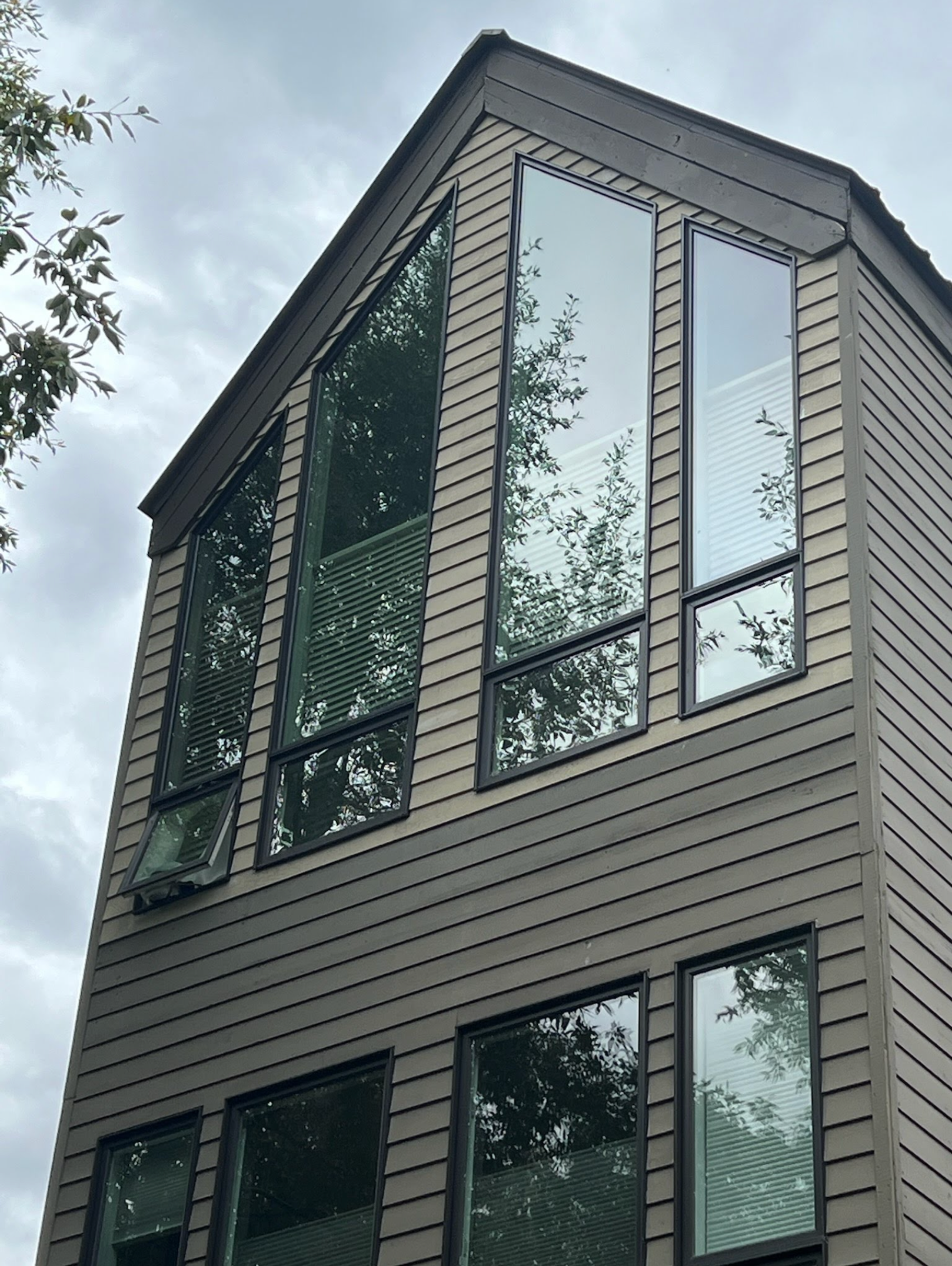 a large building with a lot of windows  installed by Sun Glass Cortez