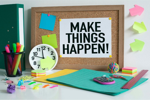 Desk with message to Make things happen