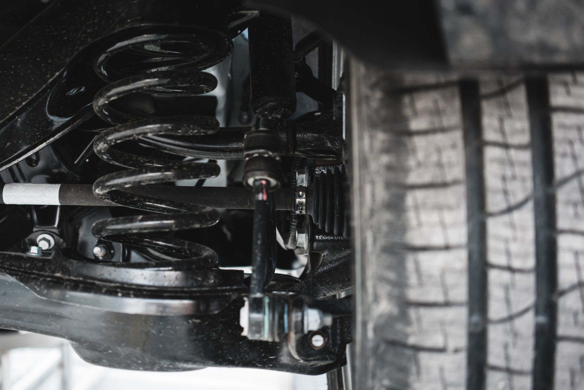 Close-up on Car Suspension — Stafford, Qld — All Torque Automotive