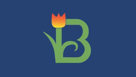 A green letter b with a red tulip on it