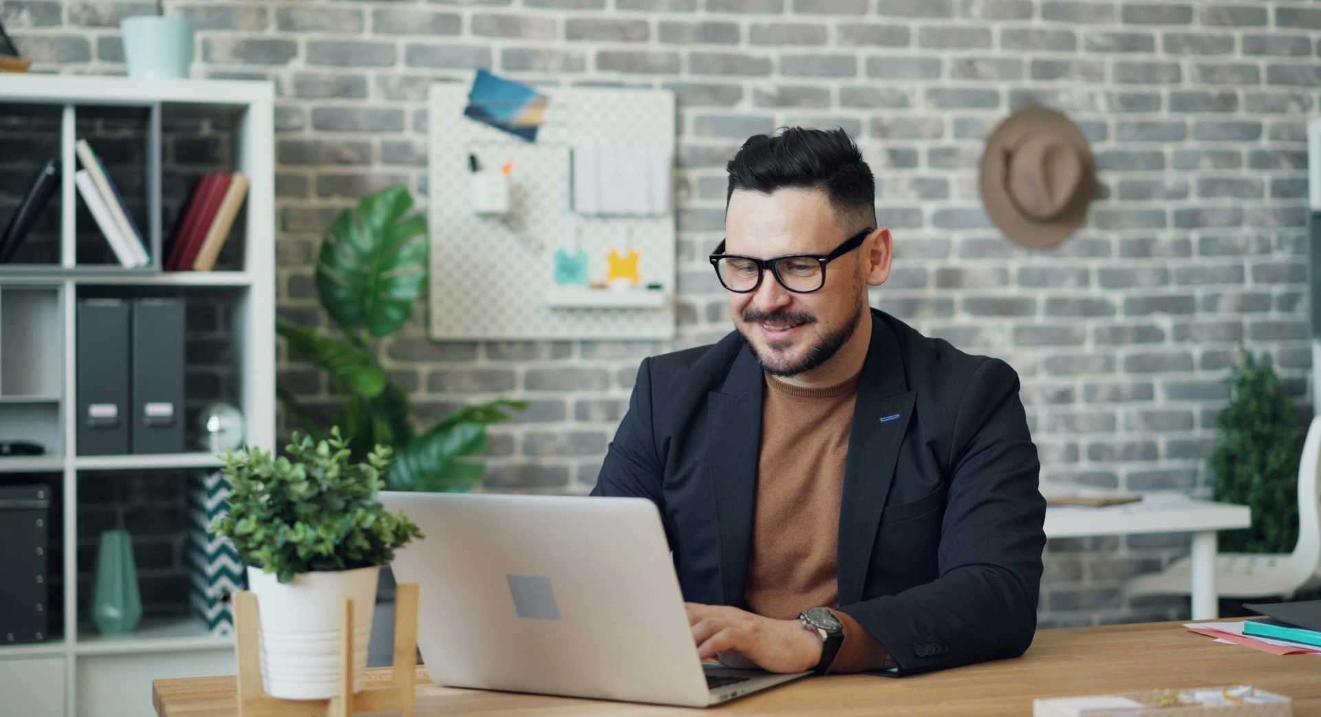  man working on his laptop omputer