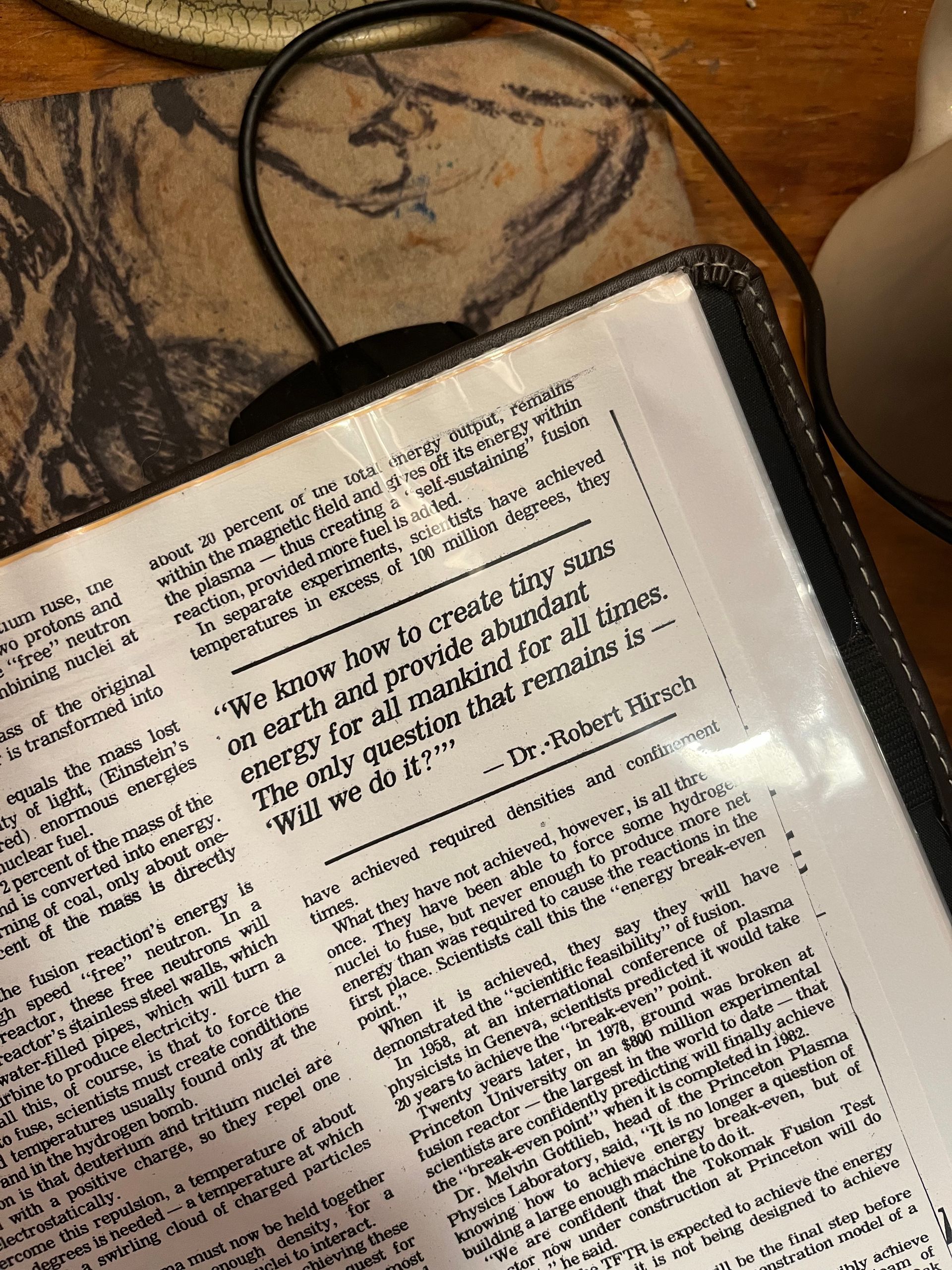 A book is open to a page that says