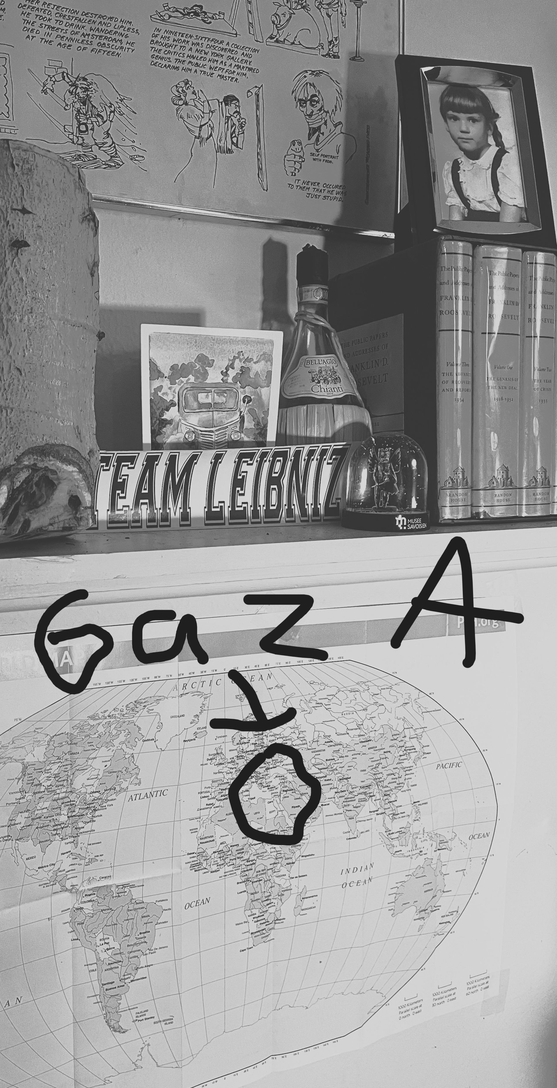 A black and white photo of a wall with gaza written on it