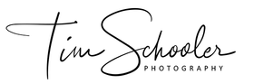 A black and white logo for tim schooler photography.