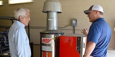 Two Men Talking About Financing Programs — Boulder, CO — Hotsy Equipment of Boulder