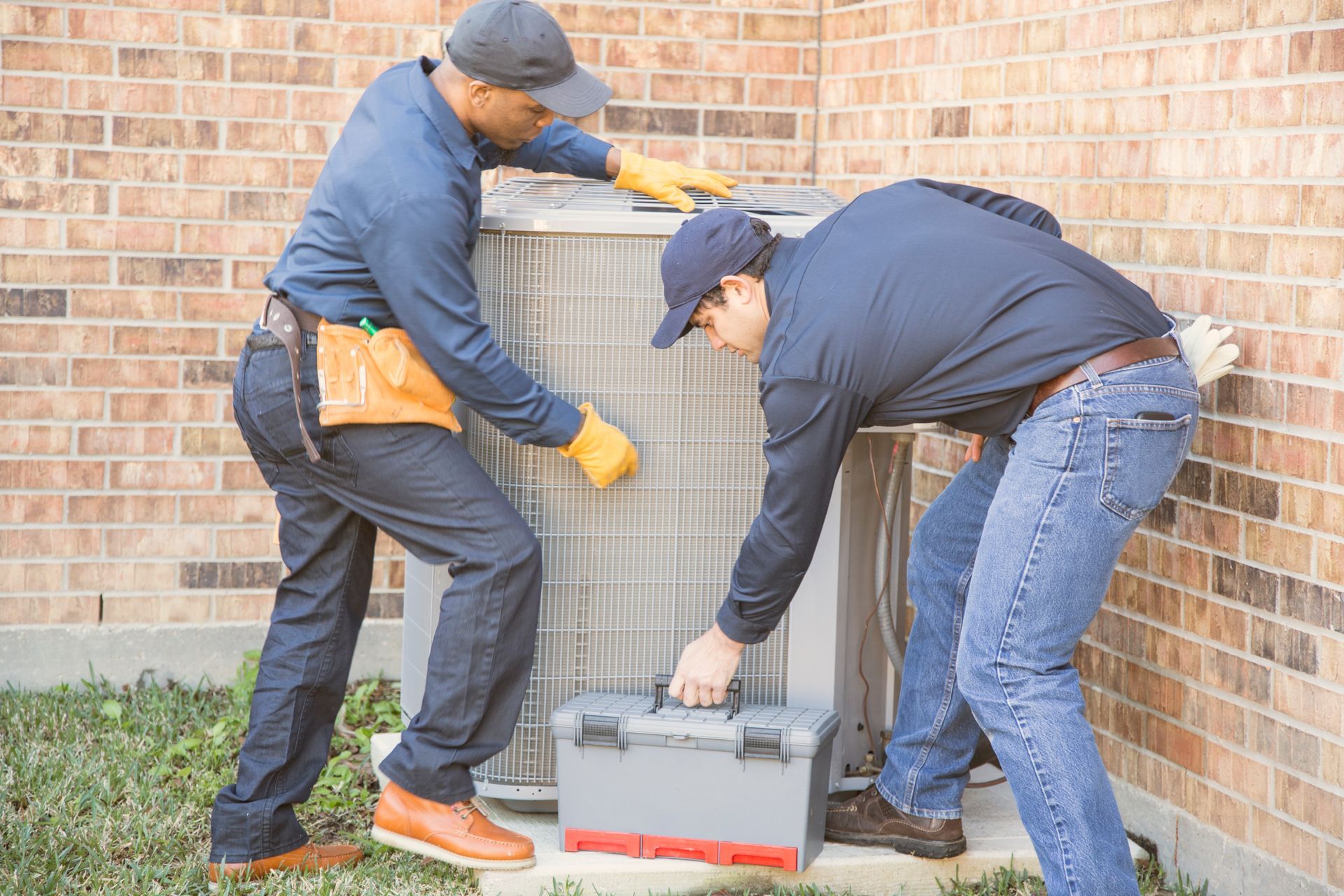 HVAC contractors working on efficient air conditioning repair service.