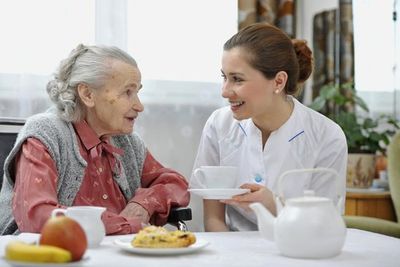 Elder Care — Old Woman with Caregiver in Tulare, CA