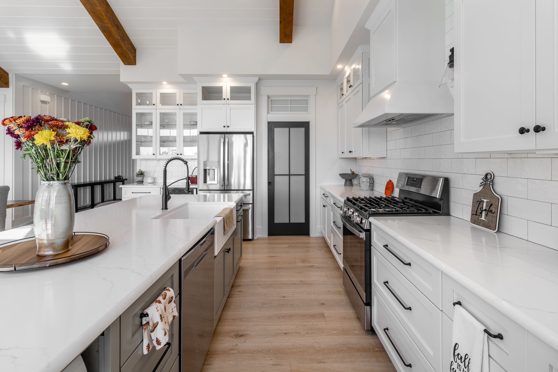 Custom home builder home State College, PA. Farmhouse style kitchen
White cabinets and counter tops. Amish builder