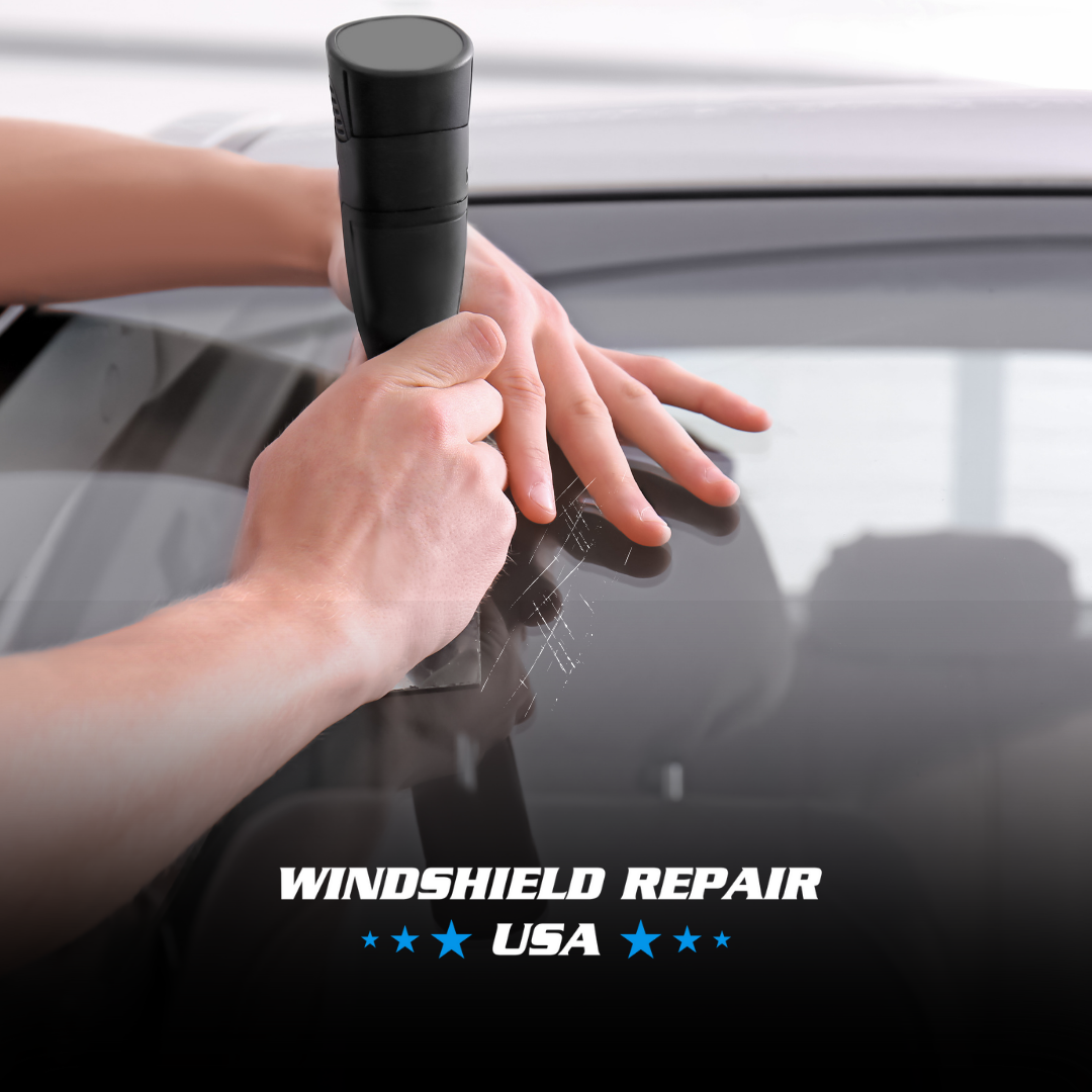 Hands with repair tool and repairing the rear windshield