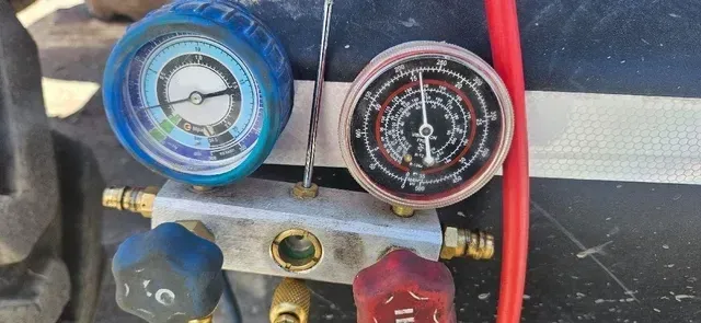 A Close up Of a Couple of Gauges on A Machine — PEPS Machinery Services In Bethania, QLD