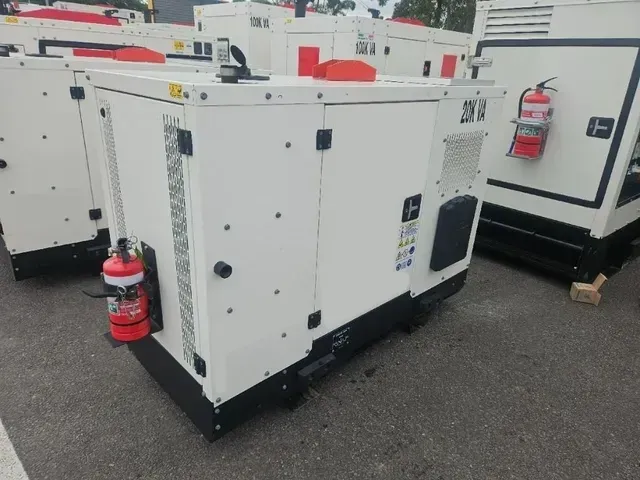A Red and White Generator with A Fire Extinguisher Attached to It — PEPS Machinery Services In Bethania, QLD