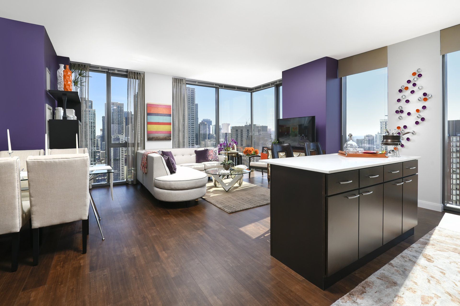 An artist 's impression of a living room with purple walls at State & Chestnut.