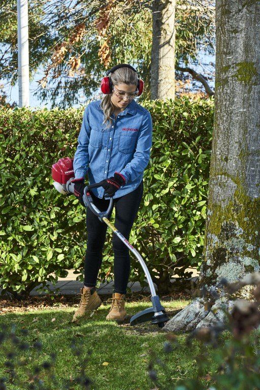 Woman Wearing Safety Gear While Gardening — Garden Equipment in Raymond Terrace, NSW