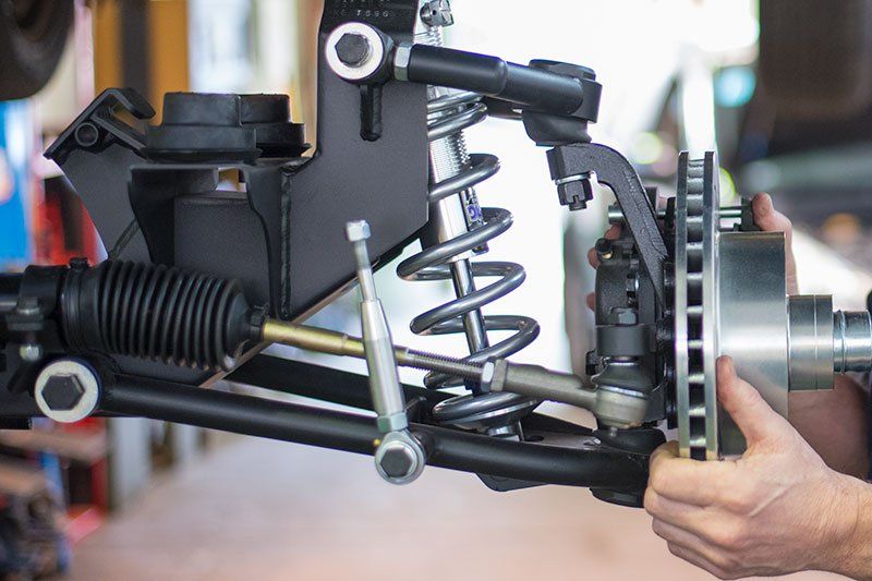 Adjusting the Car Suspension — Automotive Servicing in New Lambton, NSW