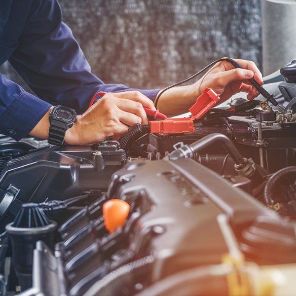 Hands of Car Mechanic Working — Automotive Servicing in New Lambton, NSW