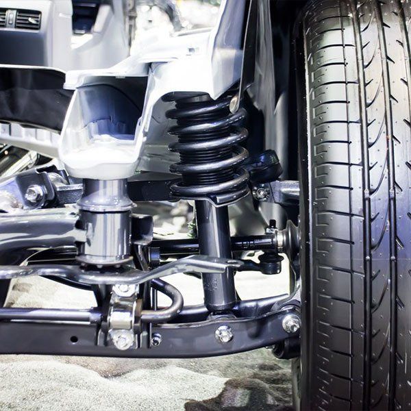New Tire and Shock Suspension Installed — Automotive Servicing in New Lambton, NSW