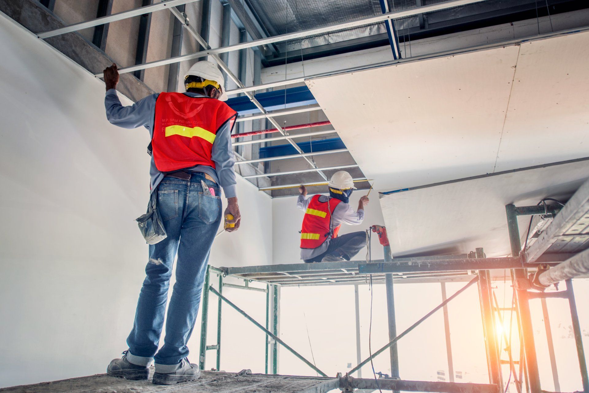 Construction worker wear safety uniform installation ceiling work