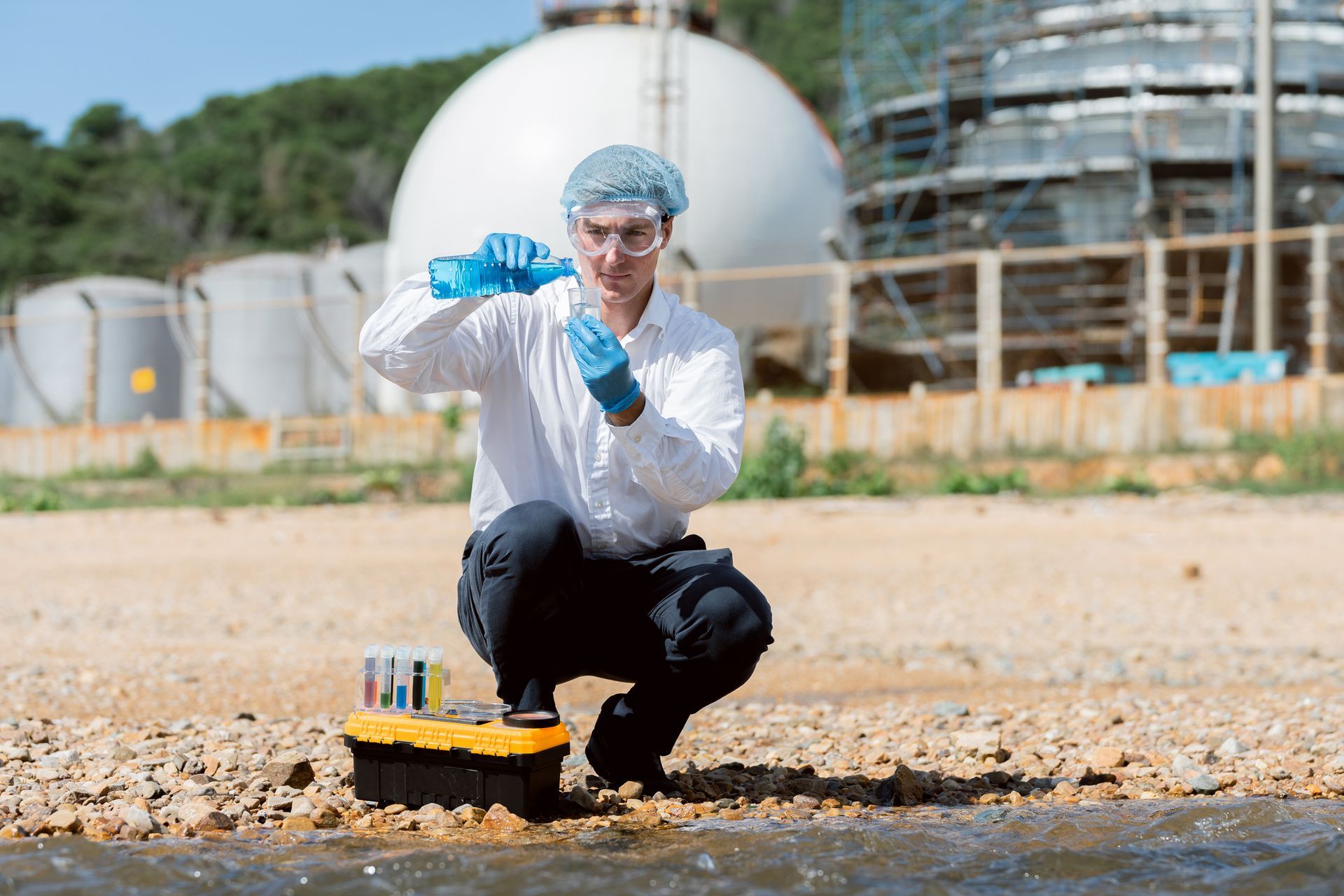 A man is testing the water. A man is testing the water.