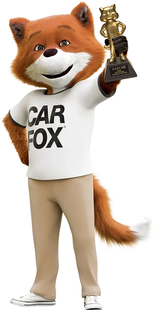 Car Fox from CarFax holding 2025 Top-Rated Service Center trophy | Freestate Auto & Truck Service