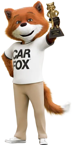 Car Fox from CarFax holding 2025 Top-Rated Service Center trophy | Freestate Auto & Truck Service