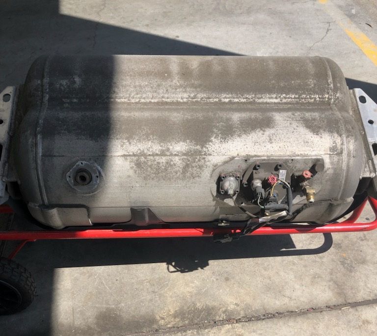 A Row of Green Gas Cylinders Stacked on Top of Each Other — Raff's Advanced Automotive P/L in Fairy Meadow, NSW