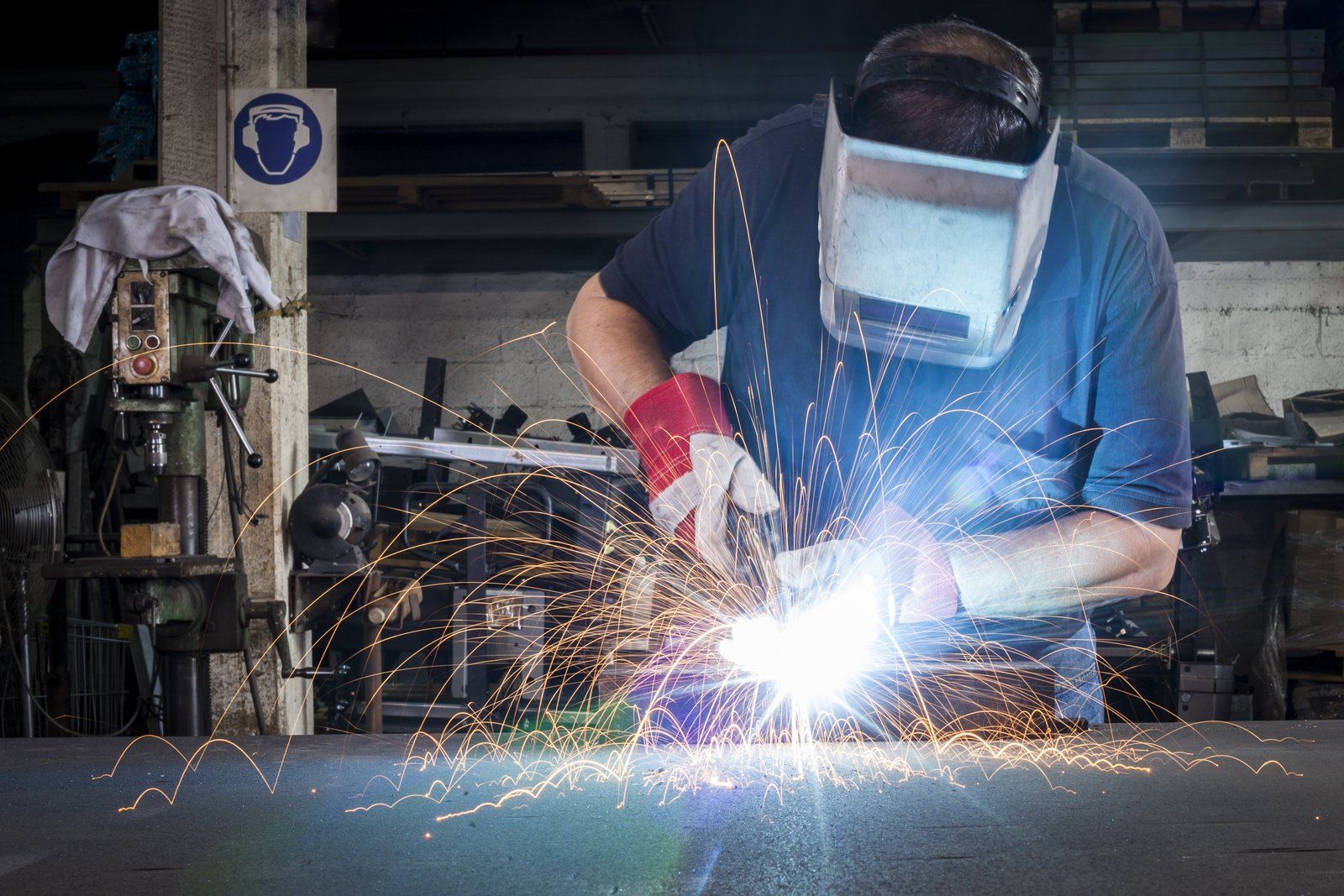 a mobile welder working at shop