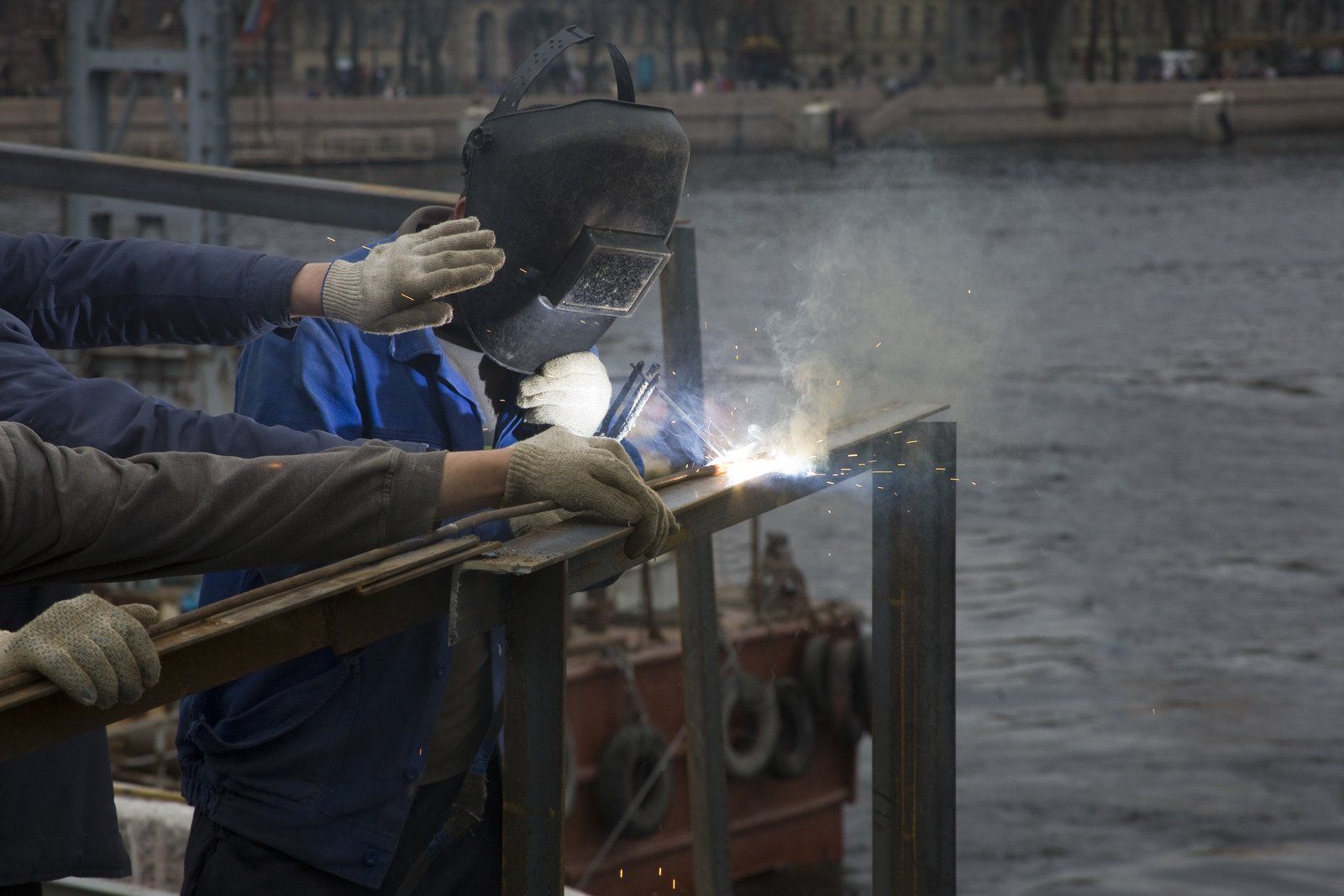 welders are creating hand rails