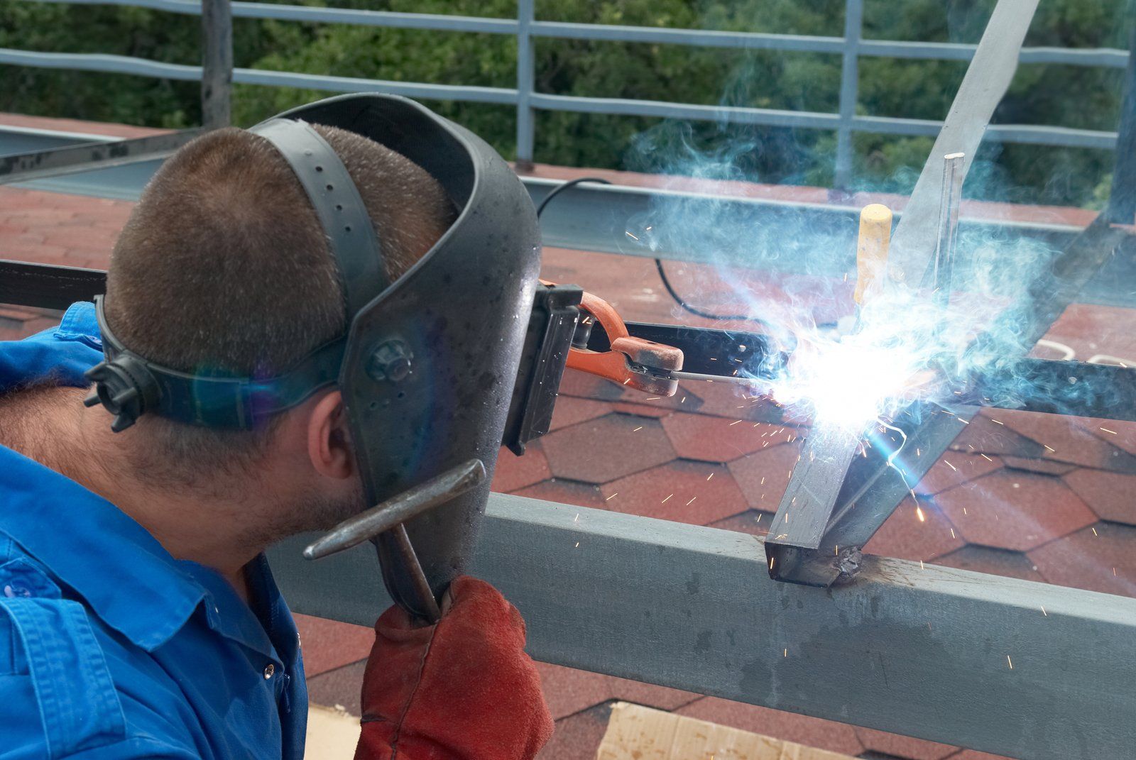 welder welding the tubular stainless steel