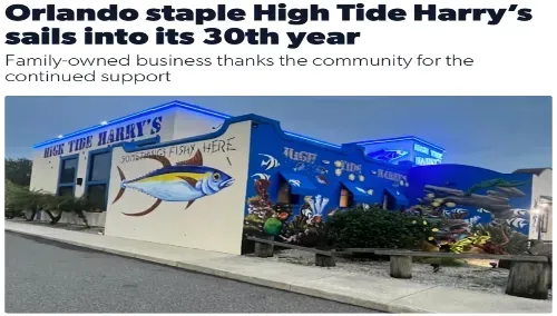 High Tide Harry's restaurant exterior with blue accents, celebrating its 30th year. Mural of a tuna on the wall.