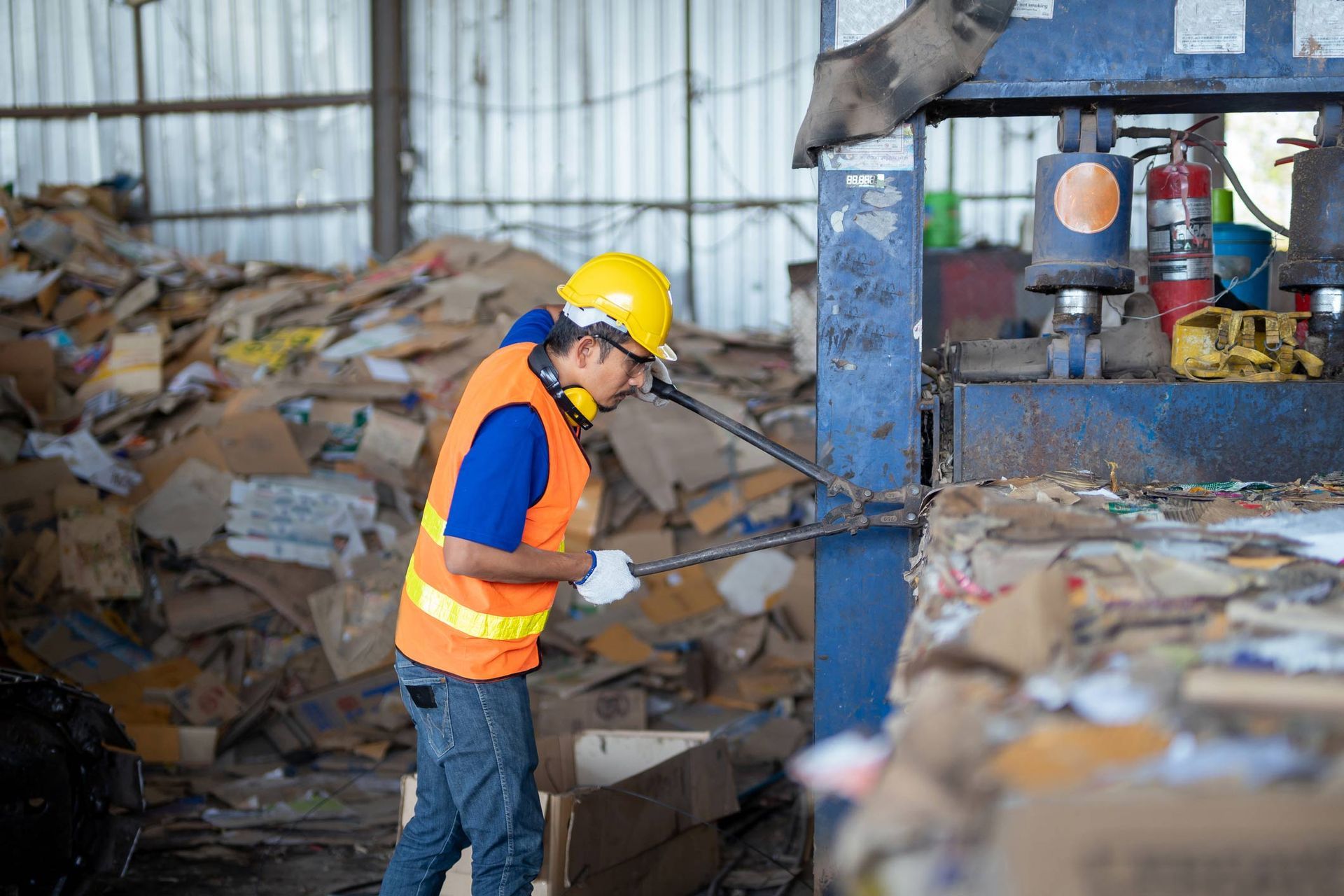 Asian Worker working — Sydney, NSW — APC Rubbish Removal