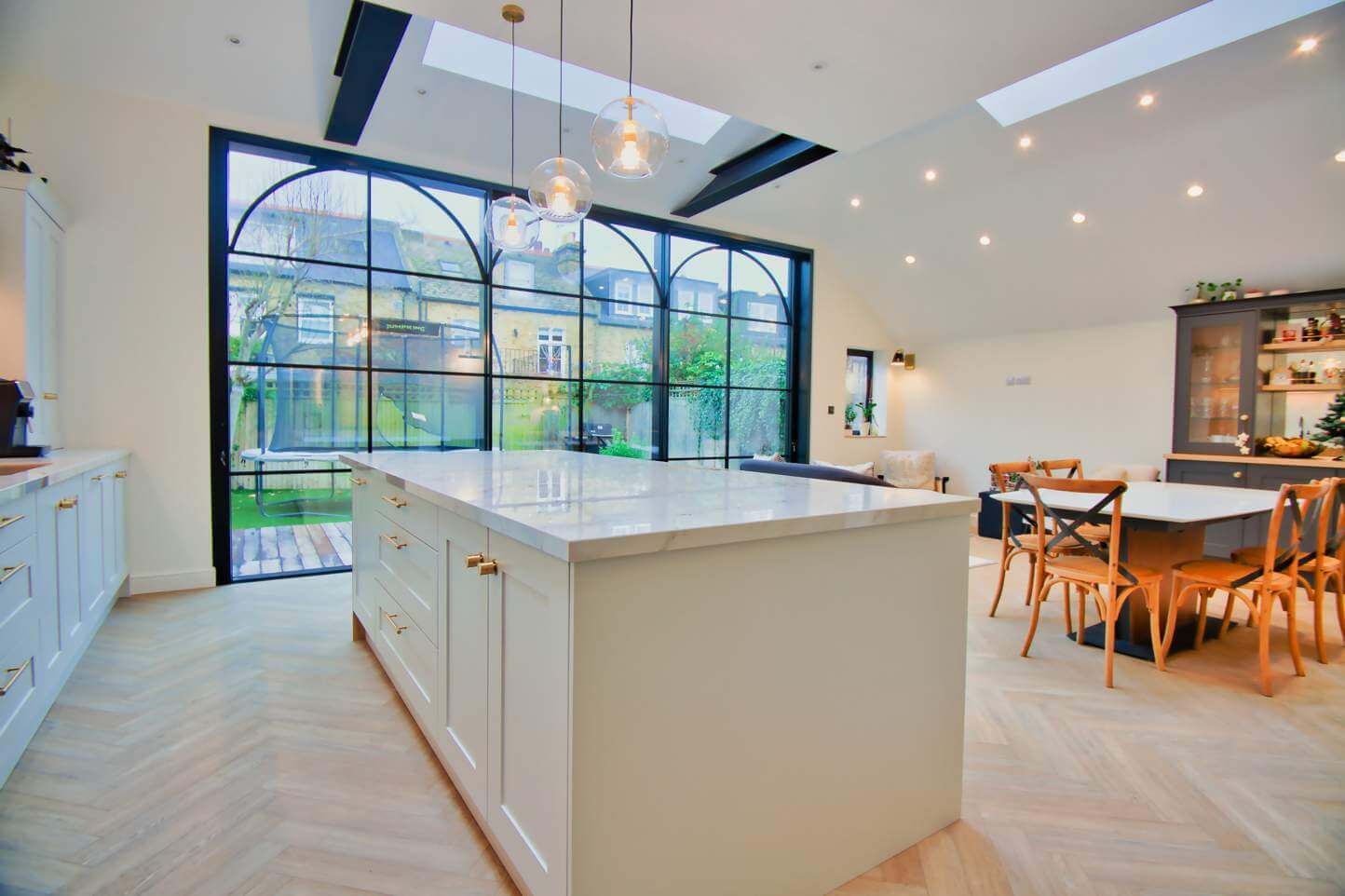 There is a large island in the middle of the kitchen.