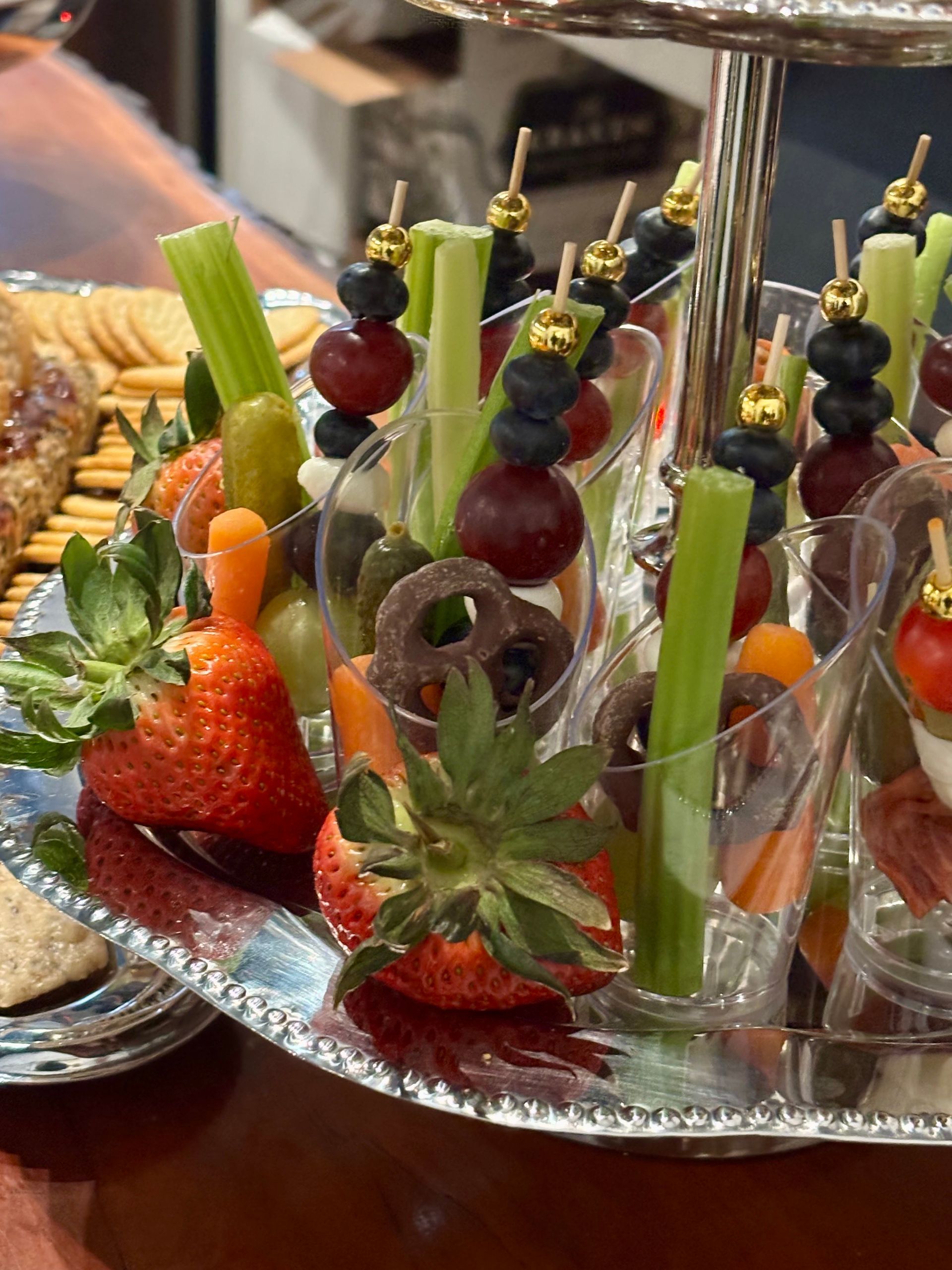 Glasses filled with fruit and vegetables on a table