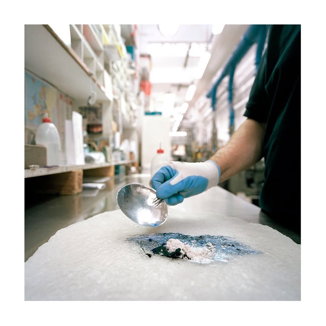 Cotton cellulose sheet being tinted with organic powder.