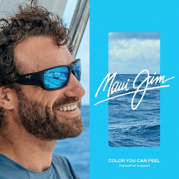 A man with a beard wearing maui jim sunglasses