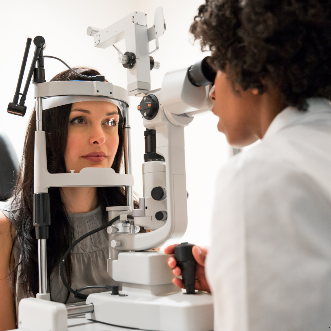 Optometrist doing an eye exam.