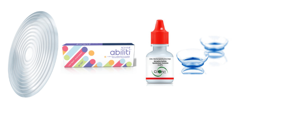 Contact lens packaging with a lens case, solution bottle, and clear contact lenses on a white background