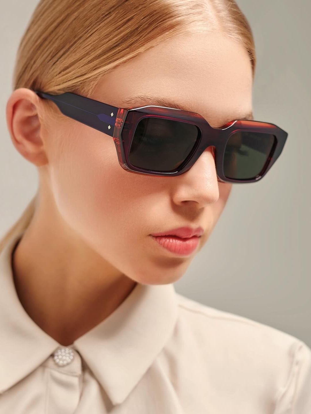 A woman wearing sunglasses.