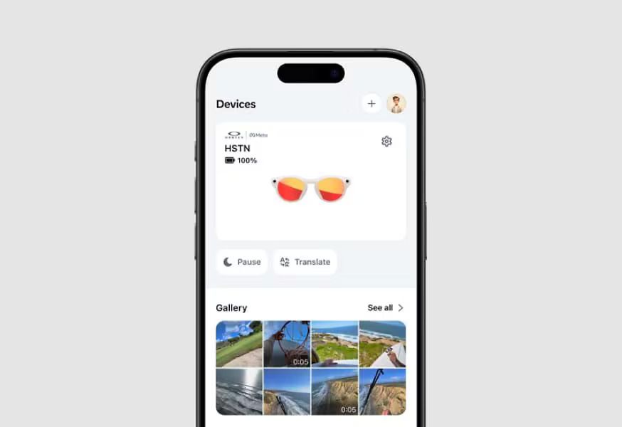 A cell phone with a picture of a pair of meta oakley sunglasses on the screen.