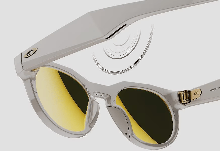 A pair of oakley sunglasses with yellow lenses on a white background