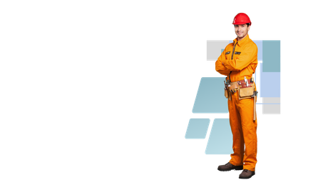 A man in a hard hat and orange overalls is standing with his arms crossed.