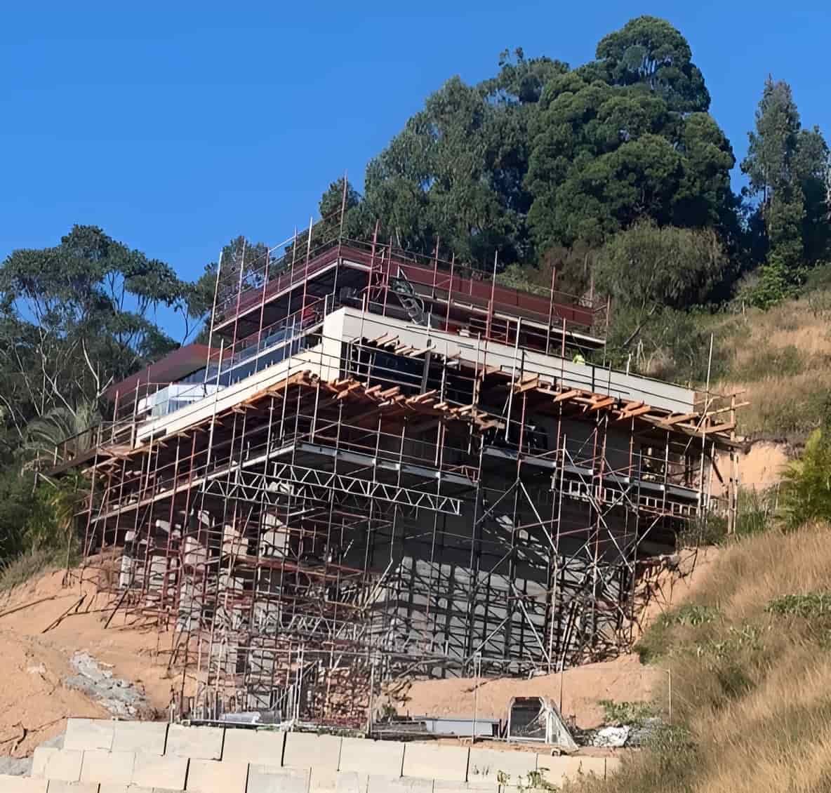 Construction of A Large Building on Top of A Hill — Big River Scaffolding Solutions Pty Ltd in Maclean, NSW