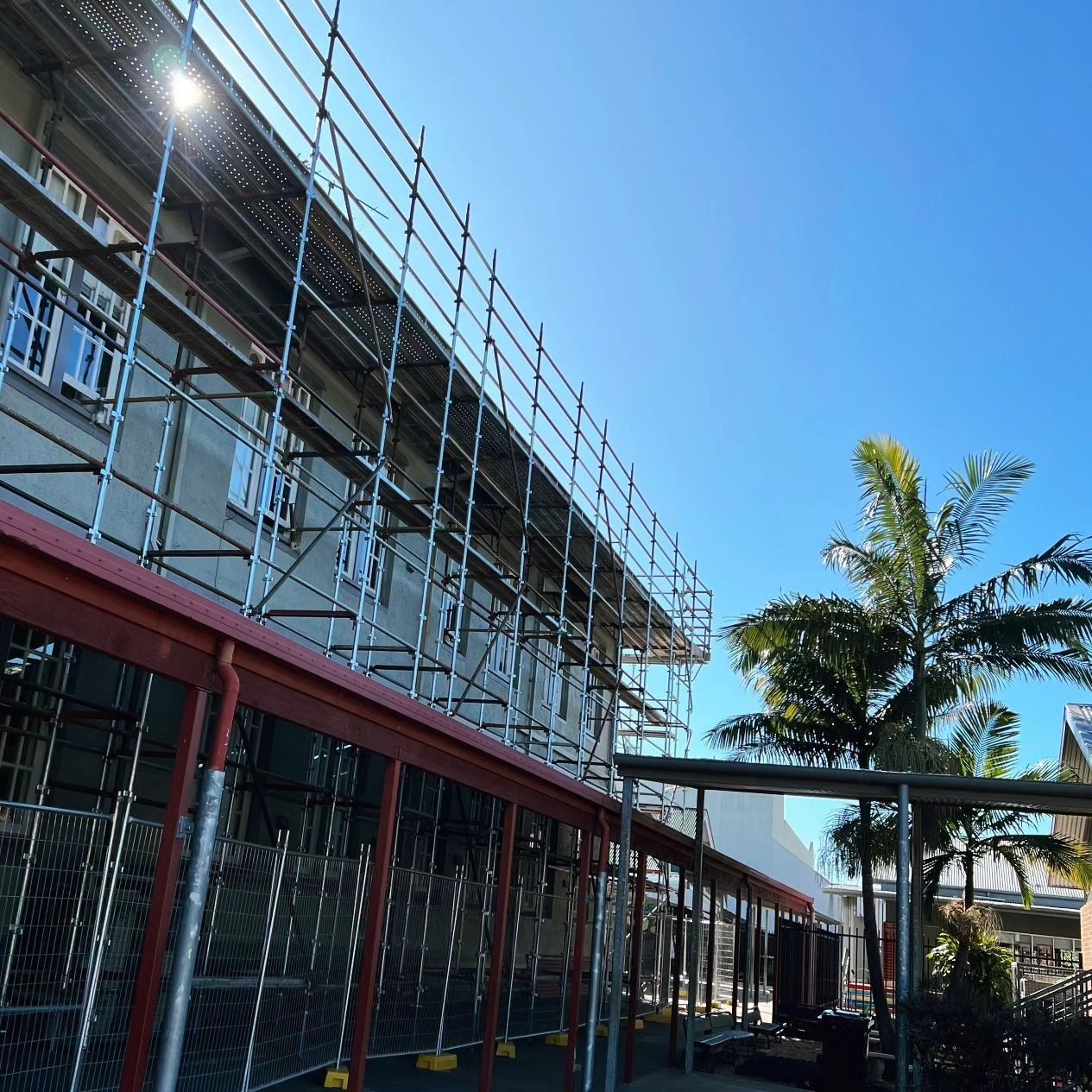 Scaffolding Lines a Two-story Building