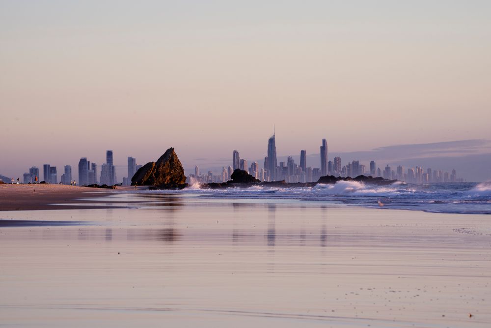 View Of A Beach Against Buildings